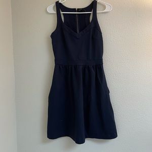 Navy blue mini dress with pockets.